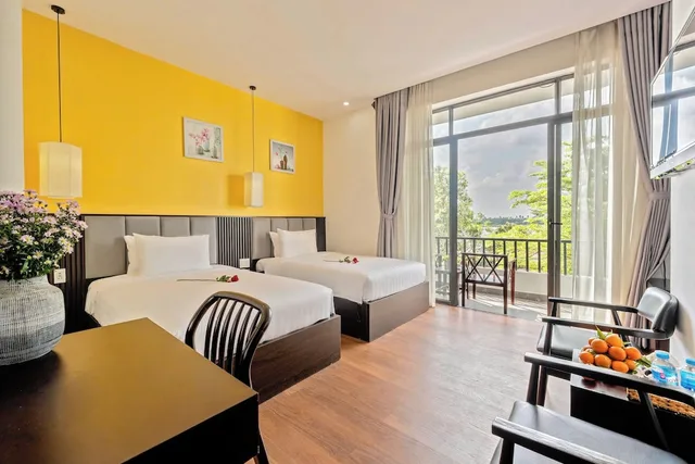 غرفة بسريرين منفصلين بشرفة، Gia Huy Riverside Hotel Hoi An 8/10