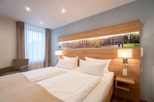 غرفة كومفورت ثلاثية بسرير كوين وسرير فردي، Hotel Deutscher Hof 1/3