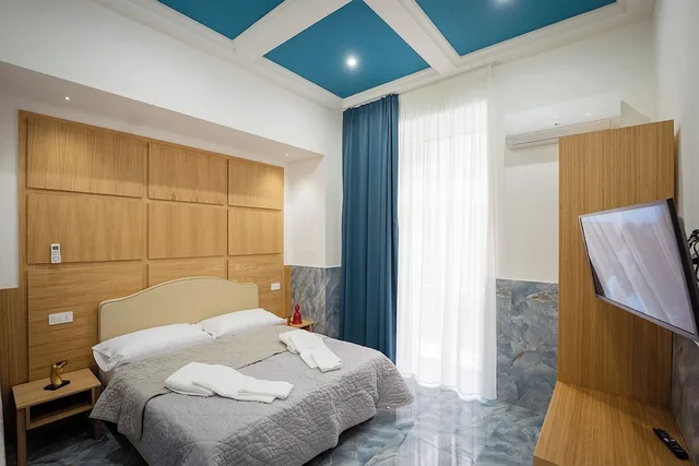 غرفة سوبيريور بسرير مزدوج في الملحق، B&B Le 4 Stagioni Dante's Suites 1/6