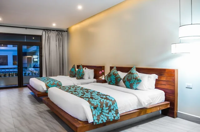 غرفة بريميير ديلوكس عائلية بسريرين كينج، Bayon Modern Residence 1/3