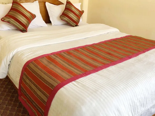 غرفة ديلوكس بسرير كوين، Hotel Grand Holiday 3/5