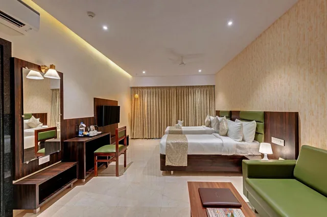 غرفة ديلوكس بسرير كينج، Guruprerna Beacon Resort Dwarka 1/1