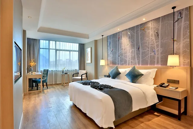 غرفة ديلوكس بسرير كينج وسرير كوين، BYLAND STAR HOTEL 1/10