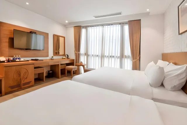 غرفة ديلوكس ثلاثية، Soho Boutique Da Nang Hotel 1/2