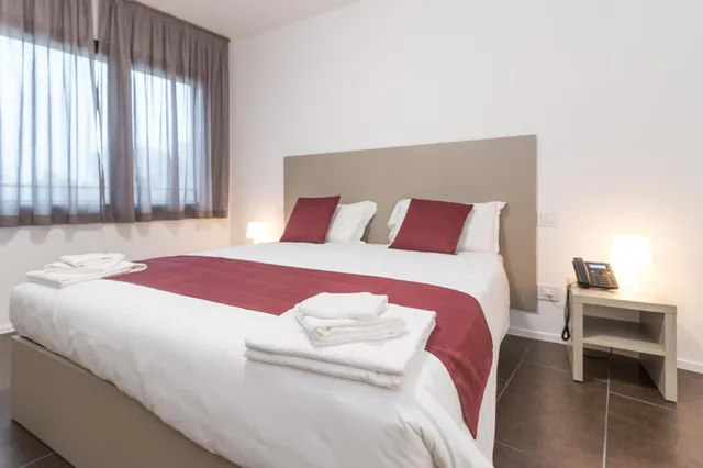 غرفة بسرير مزدوج أو سريرين منفصلين، Cascina Fossata Hotel Residence 6/10