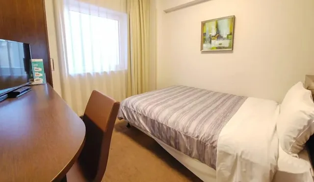 غرفة مفردة بسرير مزدوج للمدخنين، Hotel Route Inn Chitose Ekimae 1/10