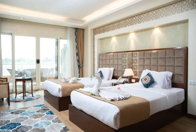 غرفة سوبيريور بسرير مزدوج بإطلالة على النهر بشرفة، Trans Nile Hotel 1/4