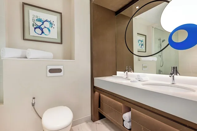 غرفة ديلوكس بسريرين منفصلين بإطلالة على المتنزه، Novotel Dubai Gold District 4/4