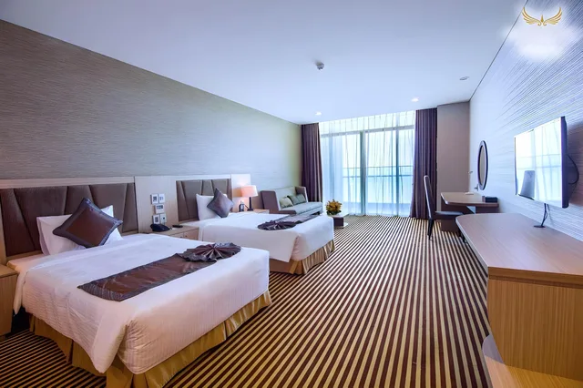 غرفة ديلوكس عائلية ثلاثية بسرير كينج وسرير فردي، Muong Thanh Luxury Khanh Hoa Hotel 3/3