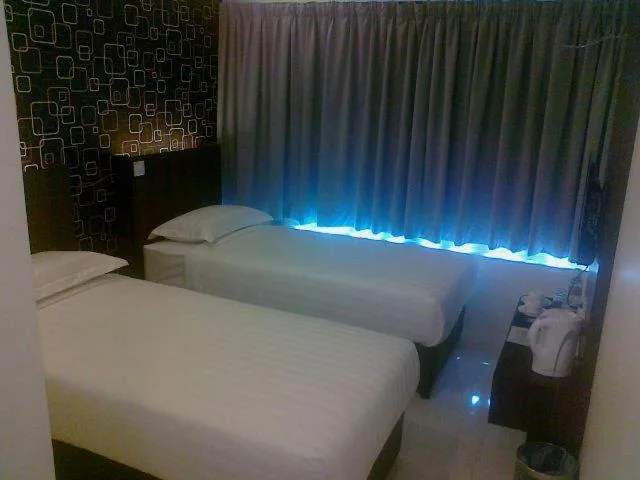 غرفة ديلوكس بسريرين منفصلين، The Regency Garden Hotel 5/7