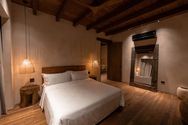 جناح ديلوكس بسرير كينج وسريرين كوين مع أريكة، Makani Luxury Wanderlust 1/5