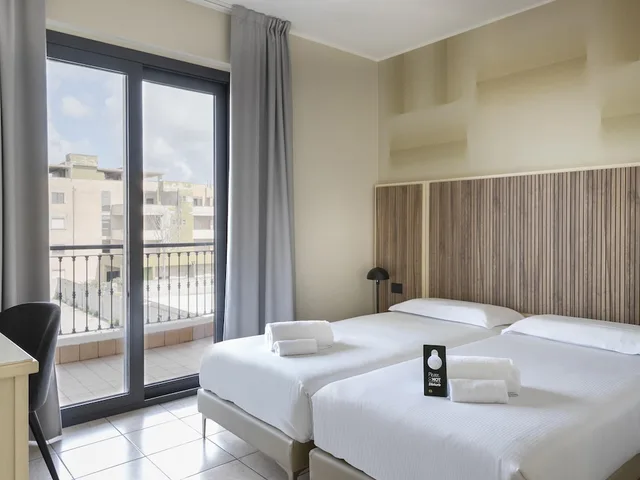 غرفة قياسية بسريرين منفصلين، B&B HOTEL Pomezia Cortese 1/4