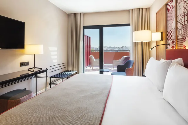 غرفة ديلوكس بسرير كينج بشرفة، Eurostars Guadalquivir 1/4