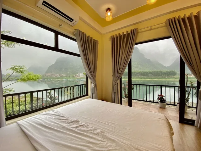 River, Deluxe, Queen Bed, Mountain View, Balcony، Phong Nha Coco Riverside Homestay 1/3
