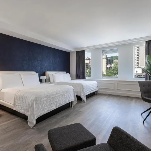 غرفة ديلوكس بسرير فردي وسريرين مزدوجين، Sens Hotel 1/4