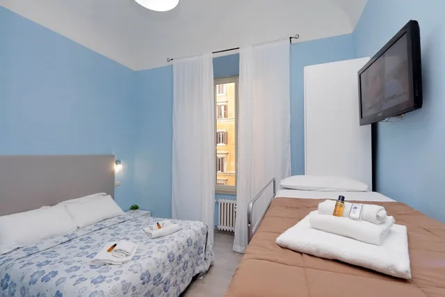 غرفة عائلية ثلاثية بسرير بطابقين وسرير كوين، B&B Domus Domas 3/8