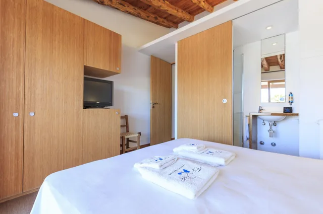 كابينة بسرير مزدوج بشرفة بإطلالة جزئية على البحر، Es Pas Formentera Agroturismo 3/8
