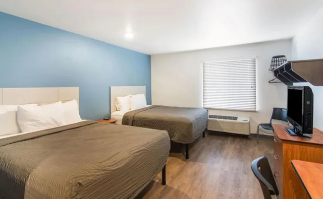 جناح بسريرين كوين بحوض استحمام لذوي الإعاقة، WoodSpring Suites Port Orange - Daytona Beach 3/8