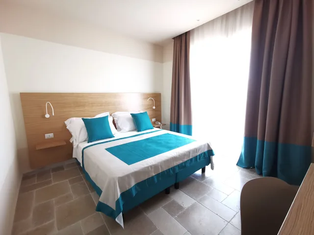 غرفة بسرير كوين بإطلالة على البحر، Maison Montechiaro 1/3