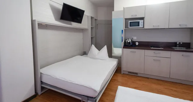 استوديو بسرير مزدوج وسريرين منفصلين بمطبخ، Acquarello Swiss Quality Hotel 2/2