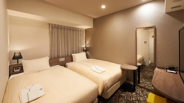 غرفة مفردة بسريرين منفصلين للمدخنين، SOTETSU FRESA INN GINZA-NANACHOME 1/1