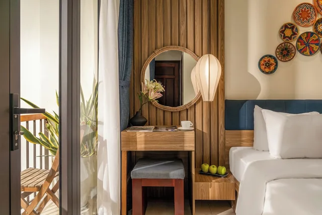 غرفة ديلوكس بسرير كينج بشرفة، Southern Hotel Hoi An 10/10