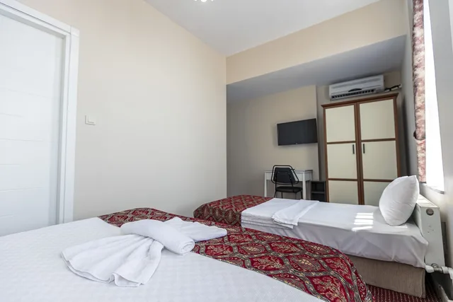 جناح عائلي بسريرين كينج وسرير فردي، OttomanZade 2/7