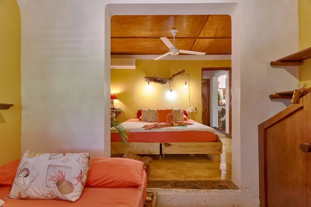 فيلا عائلية بسرير كينج وسرير فردي وسريرين كوين بـ3 غرف نوم مع أريكة، Chalet Tropical Village B&amp;B 9/10