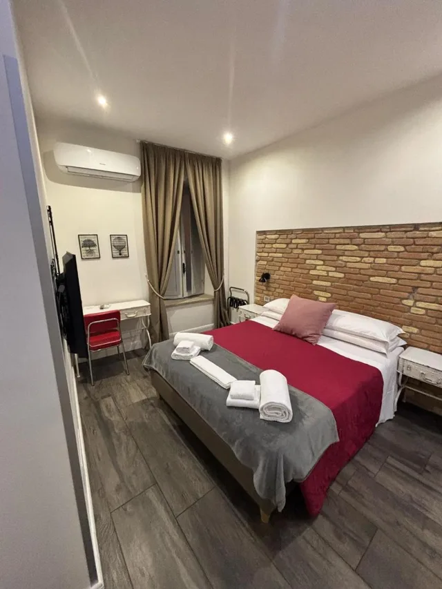 غرفة ديلوكس بسرير كوين، Trevi Contemporary Suite 1/10