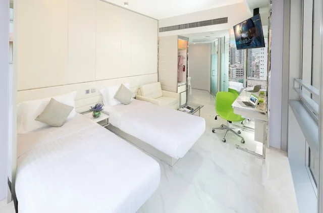 غرفة بزنس ديلوكس عائلية بسريرين منفصلين مع أريكة، iclub Mong Kok Hotel 1/3