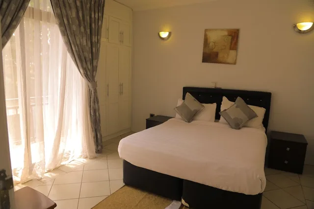 شقة ديلوكس بسرير كينج بإطلالة على الحديقة بغرفة نوم واحدة، Haile Resort Hawassa 3/7