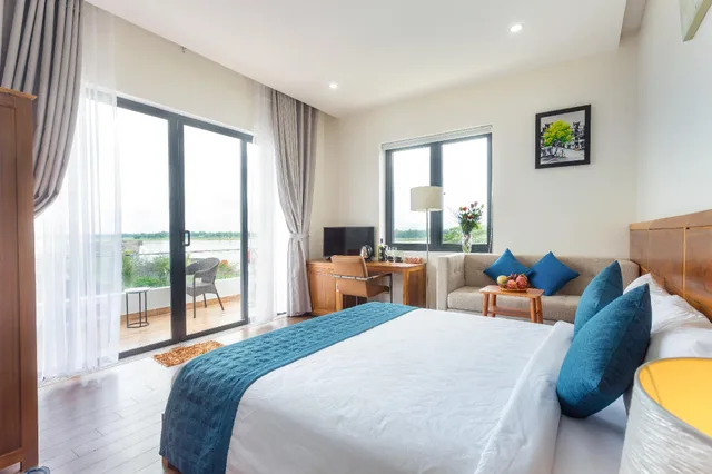 غرفة غراند ديلوكس بسرير كوين بإطلالة على النهر، Hoi An Reverie Villas 2/3