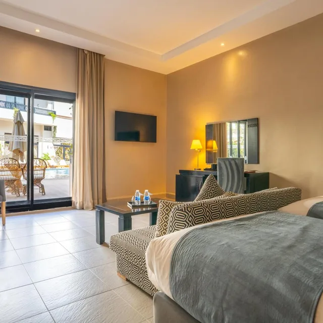 غرفة بسريرين منفصلين بإطلالة على المسبح، Kech Boutique Hotel and Spa 1/10