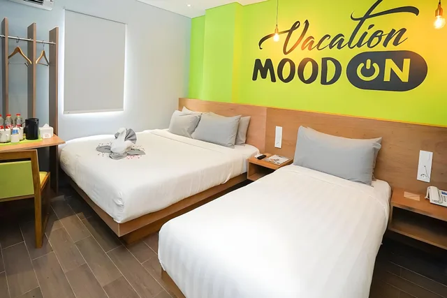 غرفة عائلية بسرير كوين وسرير فردي، Radja Art And Boutique Hotel Semarang 4/4