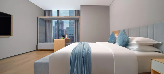 غرفة ديلوكس بسرير كينج بإطلالة على المدينة، Pagoda Hotel Hangzhou Binjiang 2/4