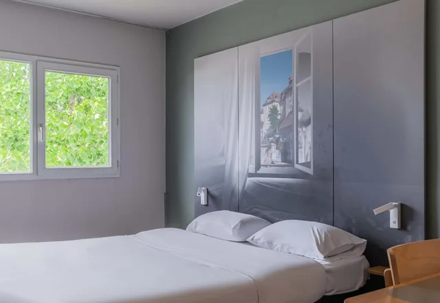 غرفة بسرير كوين، B&B HOTEL Besancon Chateaufarine 1/7