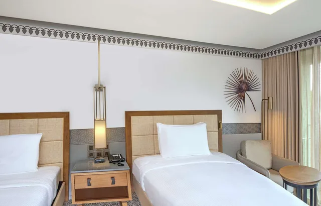 غرفة ديلوكس بسريرين منفصلين بإطلالة على الحديقة بشرفة، Doubletree By Hilton Goa Panaji 3/5