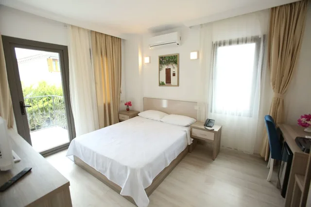 غرفة بسريرين منفصلين بإطلالة على الحديقة والمسبح، Aria Doria Otel 5/10