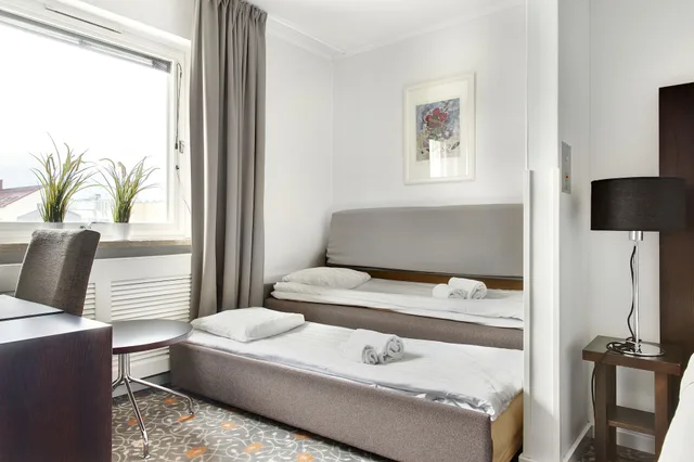 غرفة كلاسيكية بسرير كوين مع أريكة، Profilhotels Garden 4/6