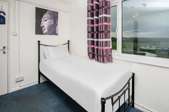غرفة قياسية بسريرين منفصلين، OYO Chriss Motel 8/10