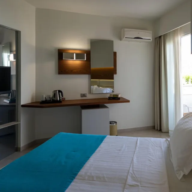 Room, Double or Twin Bed, Garden or Mountain View، Elounda Akti Olous Hotel - Adults Only 1/10