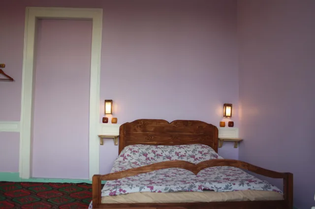غرفة ثلاثية بسرير مزدوج وسرير فردي، Lotus Garden Hostel 1/1