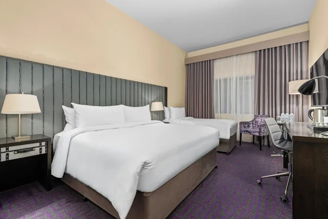 غرفة كلاسيكية ثلاثية بسرير كوين وسرير فردي، The Trinity City Hotel 2/4