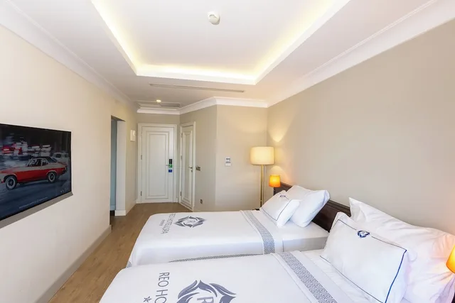 غرفة عائلية رباعية بسرير مزدوج وسريرين منفصلين، REO Hotel & Spa 1/7