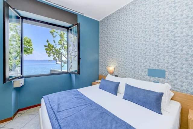 غرفة كلاسيكية بإطلالة على البحيرة، Hotel Aurora 8/10