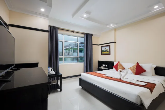 غرفة ديلوكس بسرير كينج بإطلالة على المدينة، SALITA HOTEL 1/3