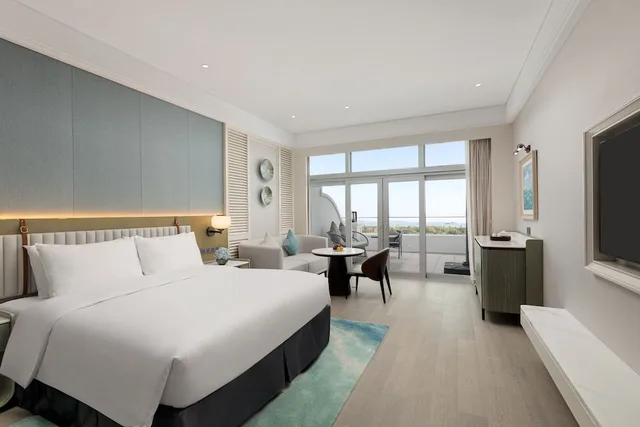 غرفة ديلوكس بسرير كينج بإطلالة على البحر بشرفة، Yuehua Hotel, Xiamen Seaside 1/2