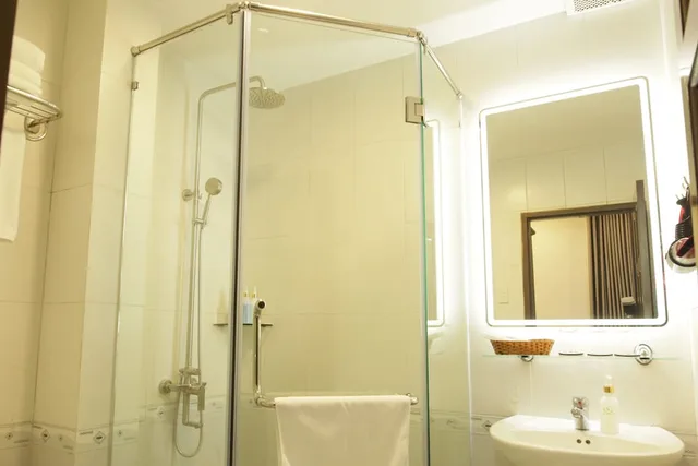غرفة ديلوكس ثلاثية بسرير كوين وسرير فردي، Lantern Hotel 8/8