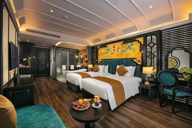 غرفة ديلوكس بسريرين منفصلين بشرفة، Grand Sunrise Palace Hoi An 2/4