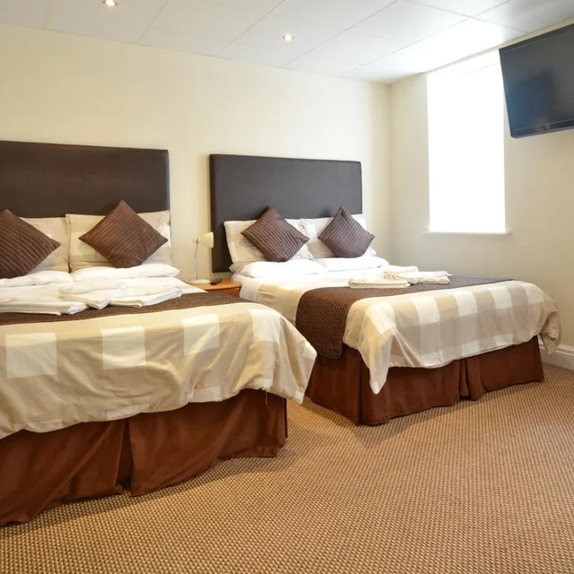 غرفة رباعية بحوض استحمام، Stuart Hotel 1/10